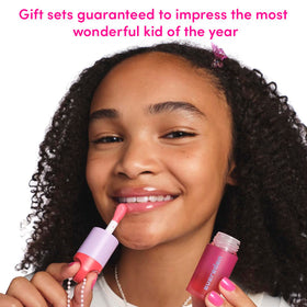 Evereden Sakura Pink kids lip gloss tube provides a gentle tint and smooth shine