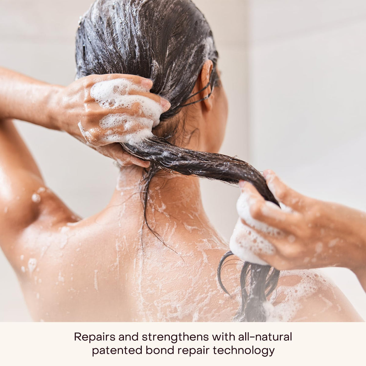 Everist Shampoo Concentrate label close-up—bond repair technology for stronger-looking hair.
