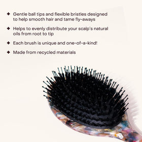 Everist Smooth and Shine brush with vegan boar bristles highlighting oil distribution for added shine.