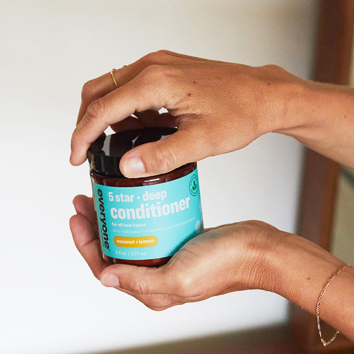 Close-up of shea butter and berry oils in Everyone Deep Conditioner formula.