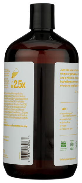 Hands holding Everyone Meyer Lemon Mandarin refill bottle for easy kitchen handwashing.
