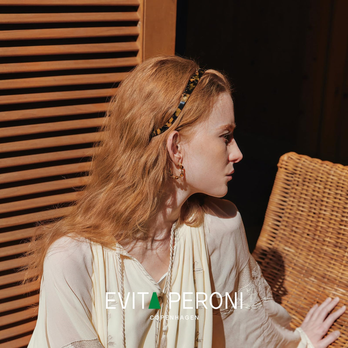 EVITA PERONI daily-use headband for skincare and workouts.