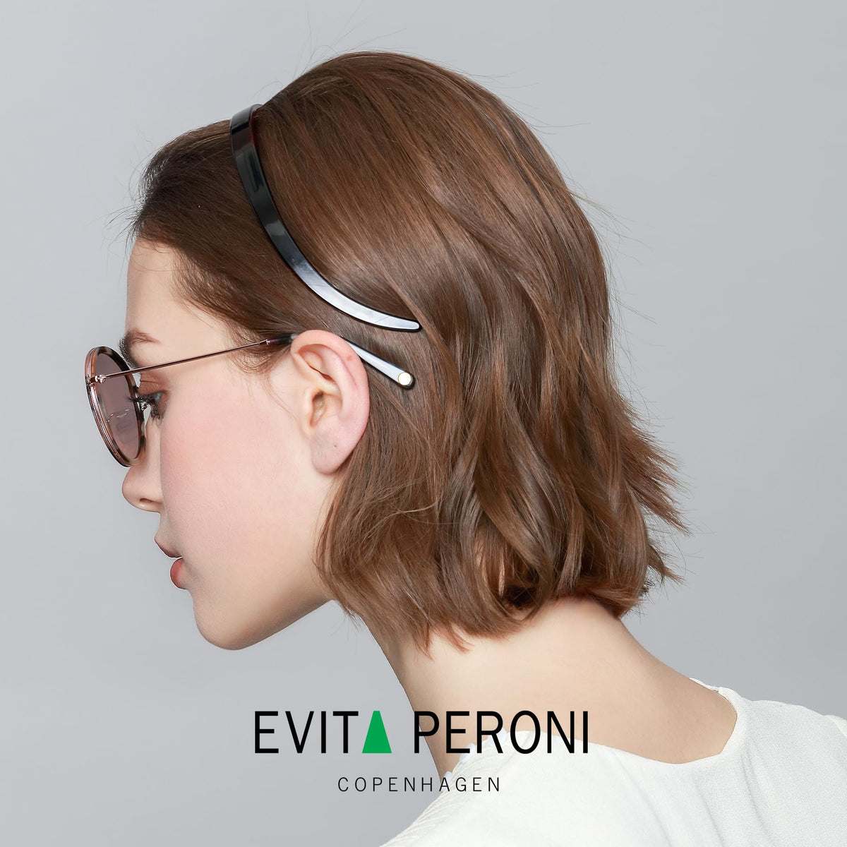 EVITA PERONI adjustable-fit headband shown on model