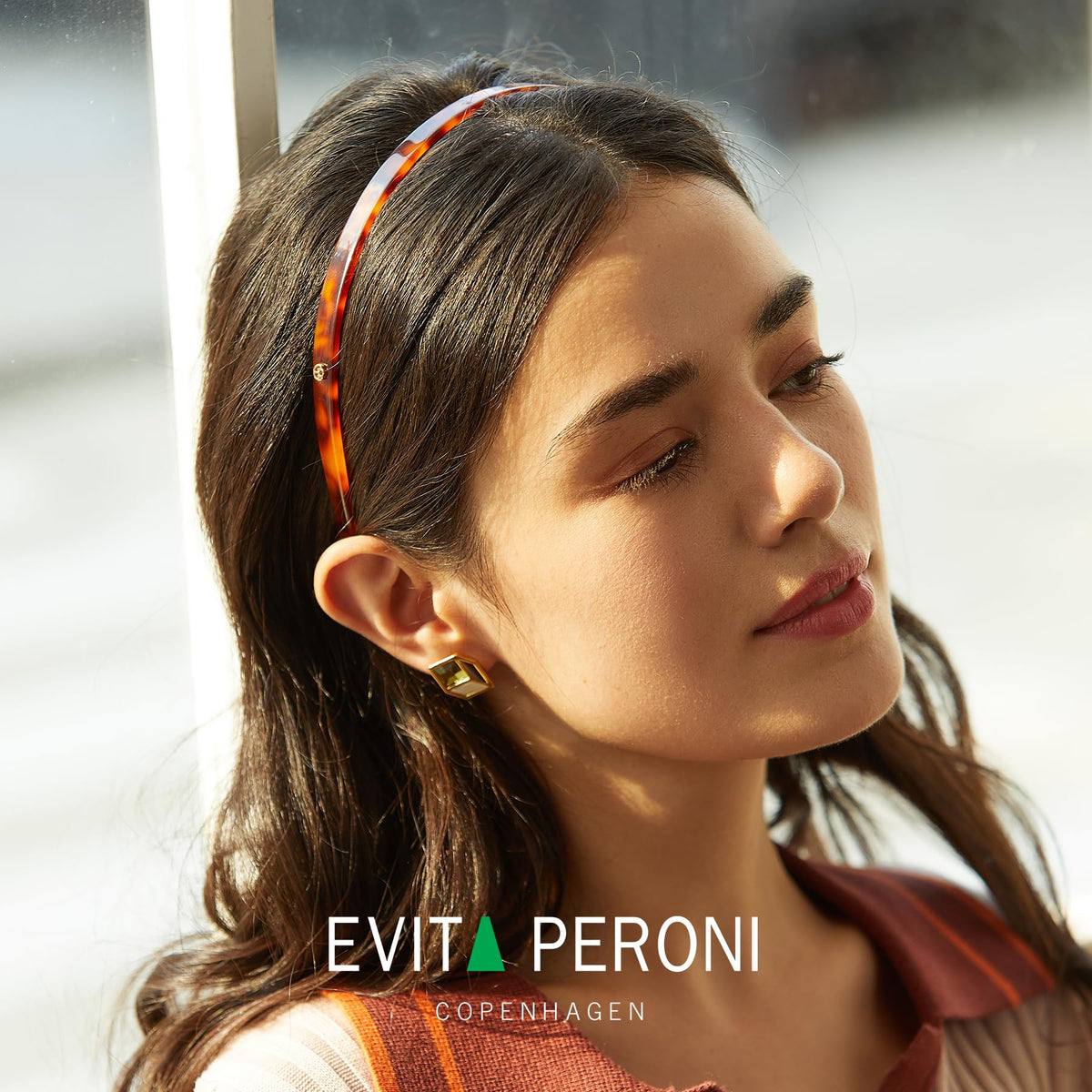 EVITA PERONI storage tube included for convenient keeping