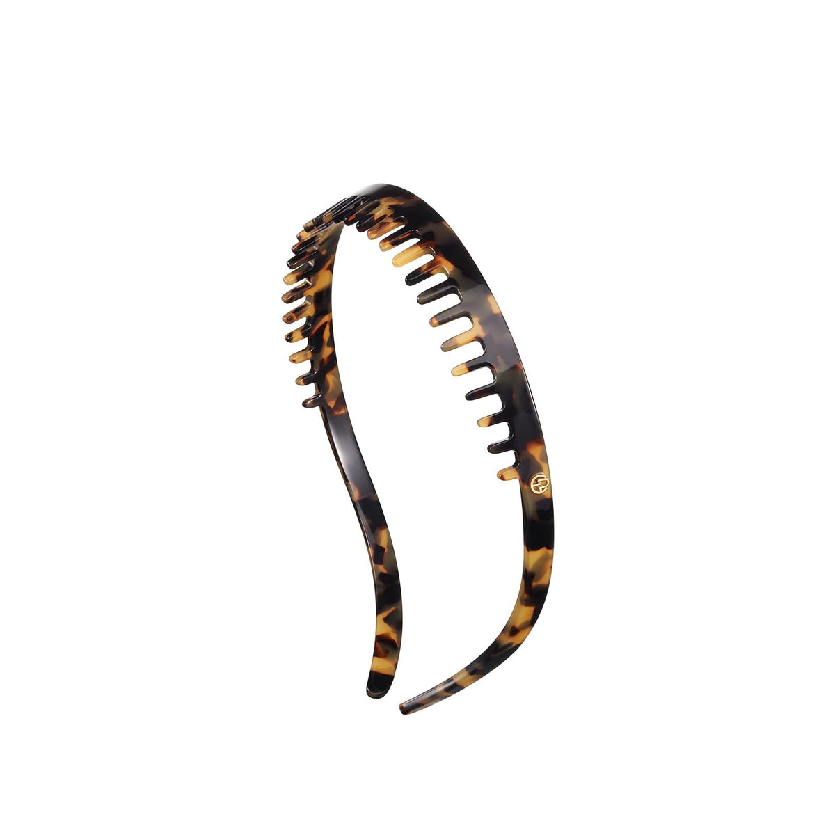 EVITA PERONI toothed non-slip headband securing hair in place.