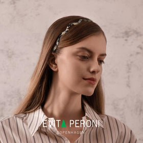 EVITA PERONI Wavy Glasses Headband worn with glasses for hands-free daily tasks