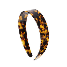 EVITA PERONI wide headband close-up with tortoise acetate finish for daily wear