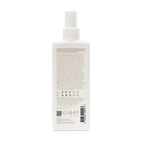 EVO Icon Welder mist being applied to hair for lightweight protection.