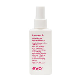 EVO Love Touch bottle close-up highlighting shine and smoothness for all hair types
