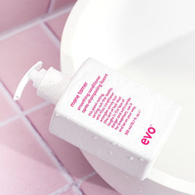 EVO Mane Tamer bottle highlighting color vibrancy protection for treated hair