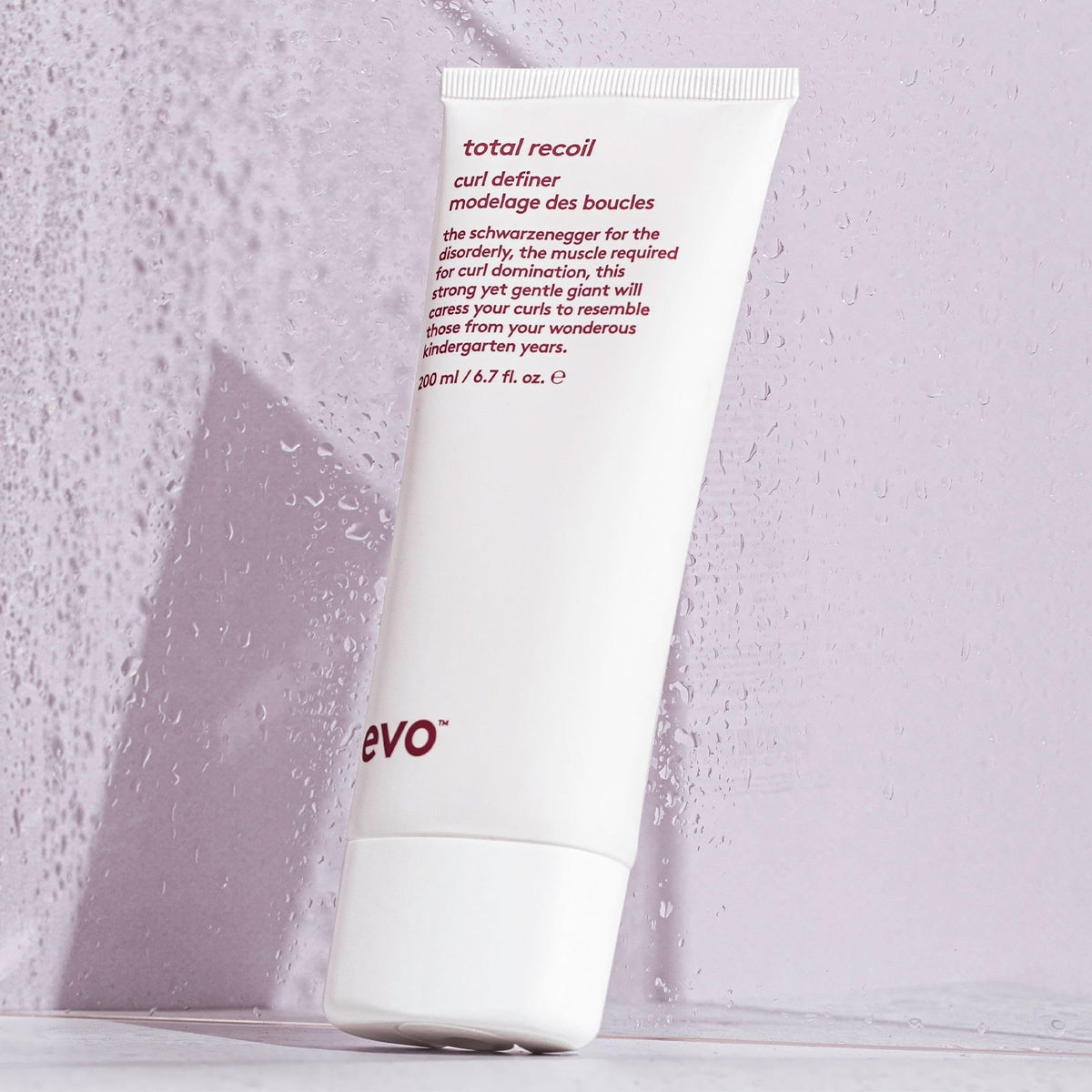 Close-up of EVO Total Recoil Curl Definer on curls shows hydration.