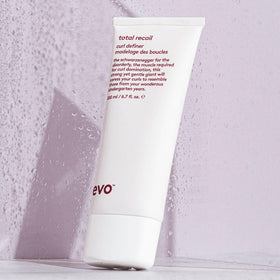 Close-up of EVO Total Recoil Curl Definer on curls shows hydration.