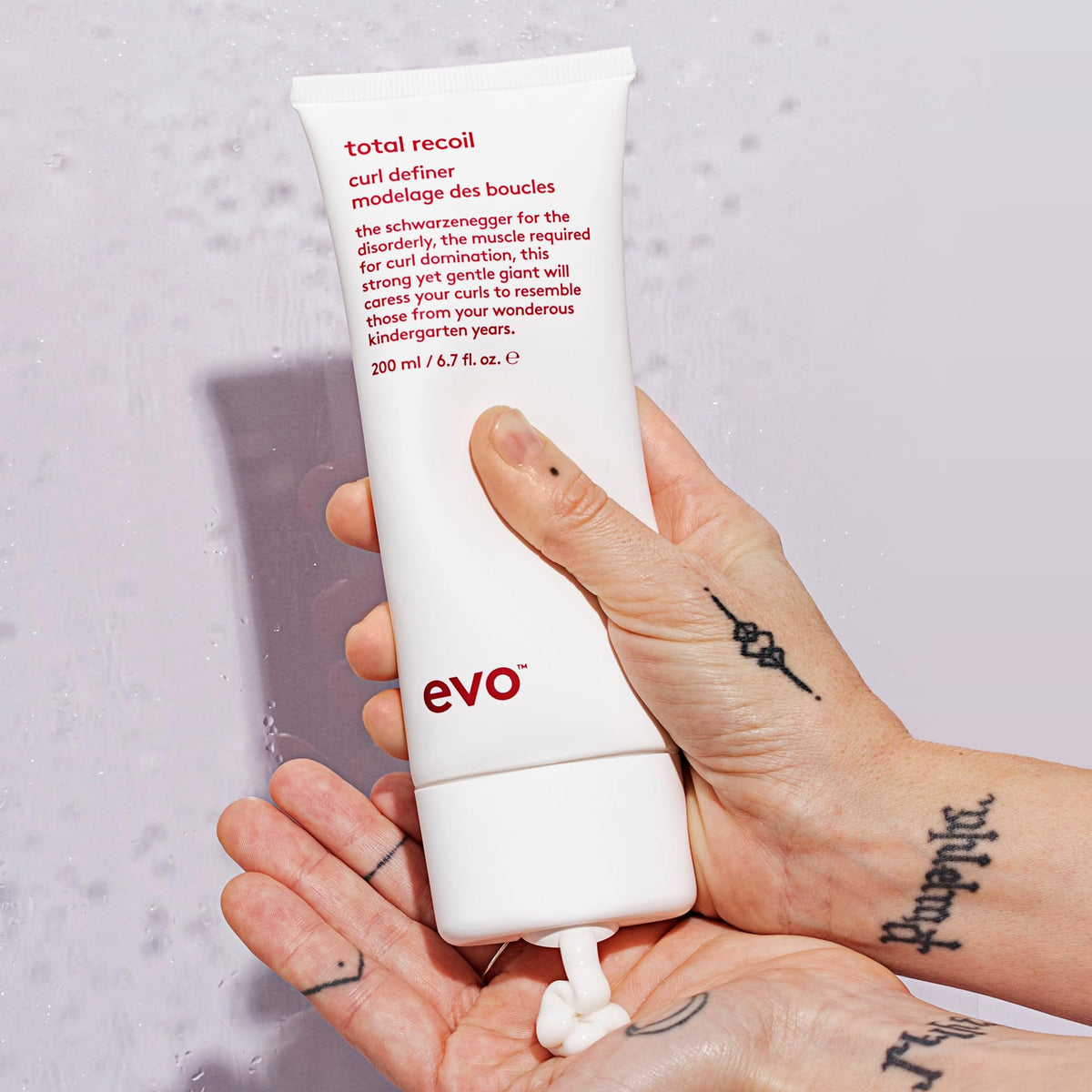 EVO Total Recoil curl defining cream in hair twist showing lasting hold