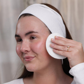 Evolve Deep Clean Micellar Water pump demonstrates easy, one-step makeup removal.