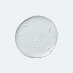 EVOLVh UltraShine Moisture Shampoo pump releasing rich lather for smooth, hydrated hair.