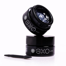 Silky gel texture of EXO LIPS Hydra Healing Lip Balm during application.