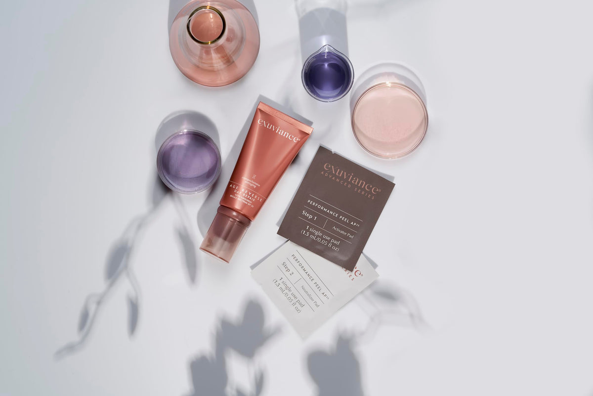 EXUVIANCE Age Reverse Day Repair SPF 30 box and jar present the complete routine