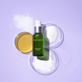 EXUVIANCE Radiance Serum glow after application suggesting luminous skin.