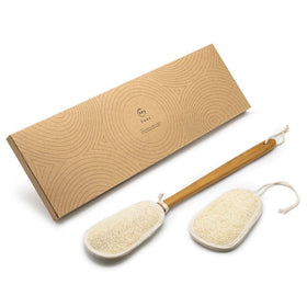 FAAY long-handle shower brush displayed in a modern bathroom.