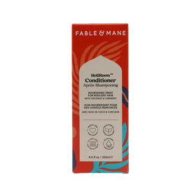 Damaged hair glow hint with Fable & Mane conditioner.