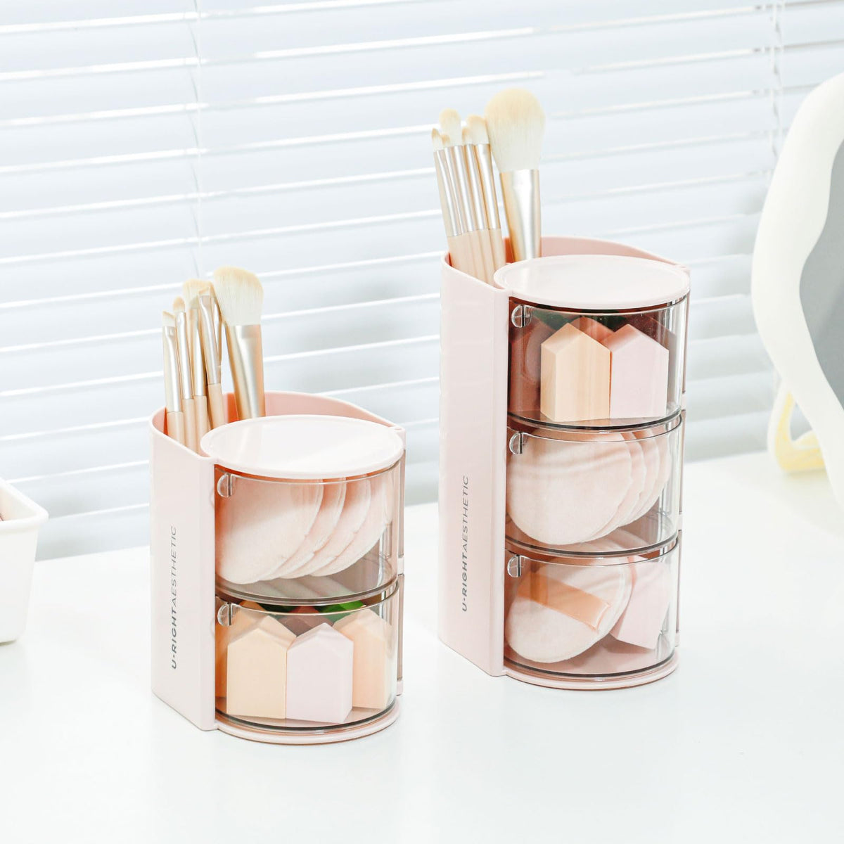 FABROK cotton swab compartment in pink keeps small items tidy.