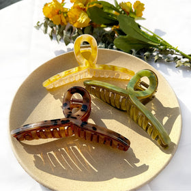 FAELBATY Big Butterfly hair clip in yellow adds color while keeping hair securely held.