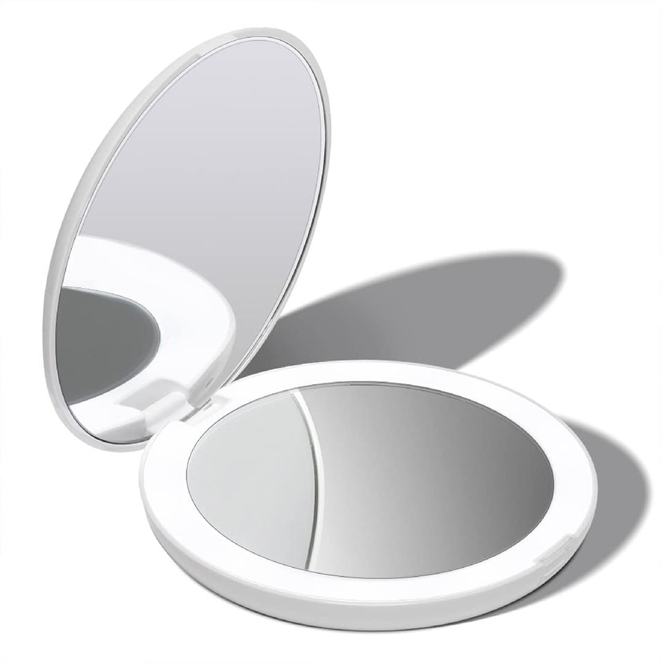 Fancii Lumi LED travel mirror with 1x/10x magnification for precise makeup and grooming.