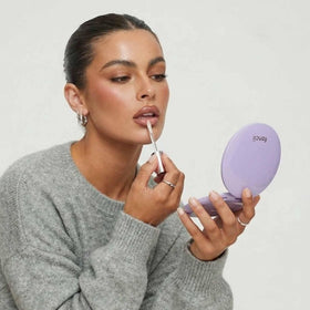 Fancii Mini Taylor folded compact in Lilac Bliss; pocket-friendly design for easy carry.