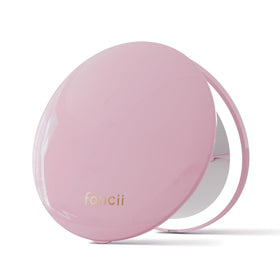 Fancii Mini Taylor mirror in closed fold, ideal for compact purse storage.