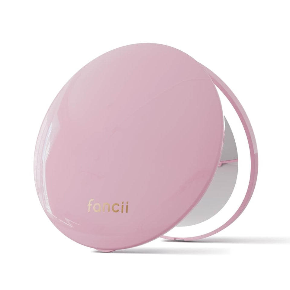 Fancii Mini Taylor mirror in closed fold, ideal for compact purse storage.