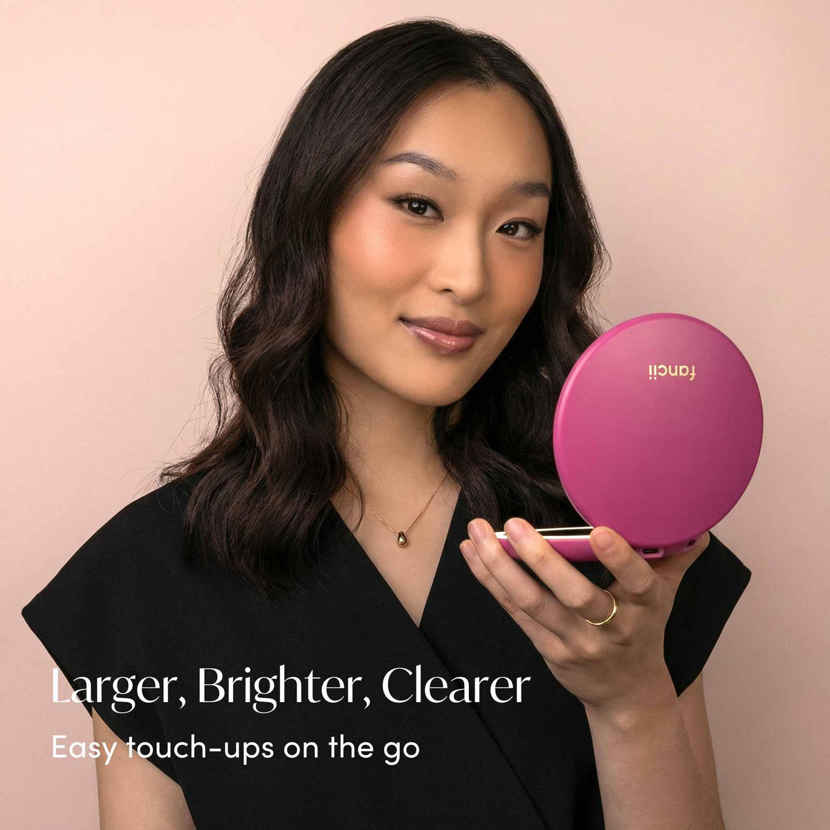 Fancii Taylor two-sided mirror, compact design for precise makeup checks anywhere.