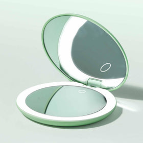 Fancii Taylor two‑sided mirror supports quick makeup and tweezing tasks.