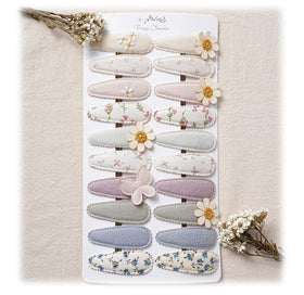 Fancy Clouds daisy embroidery baby clip adds a gentle floral touch
