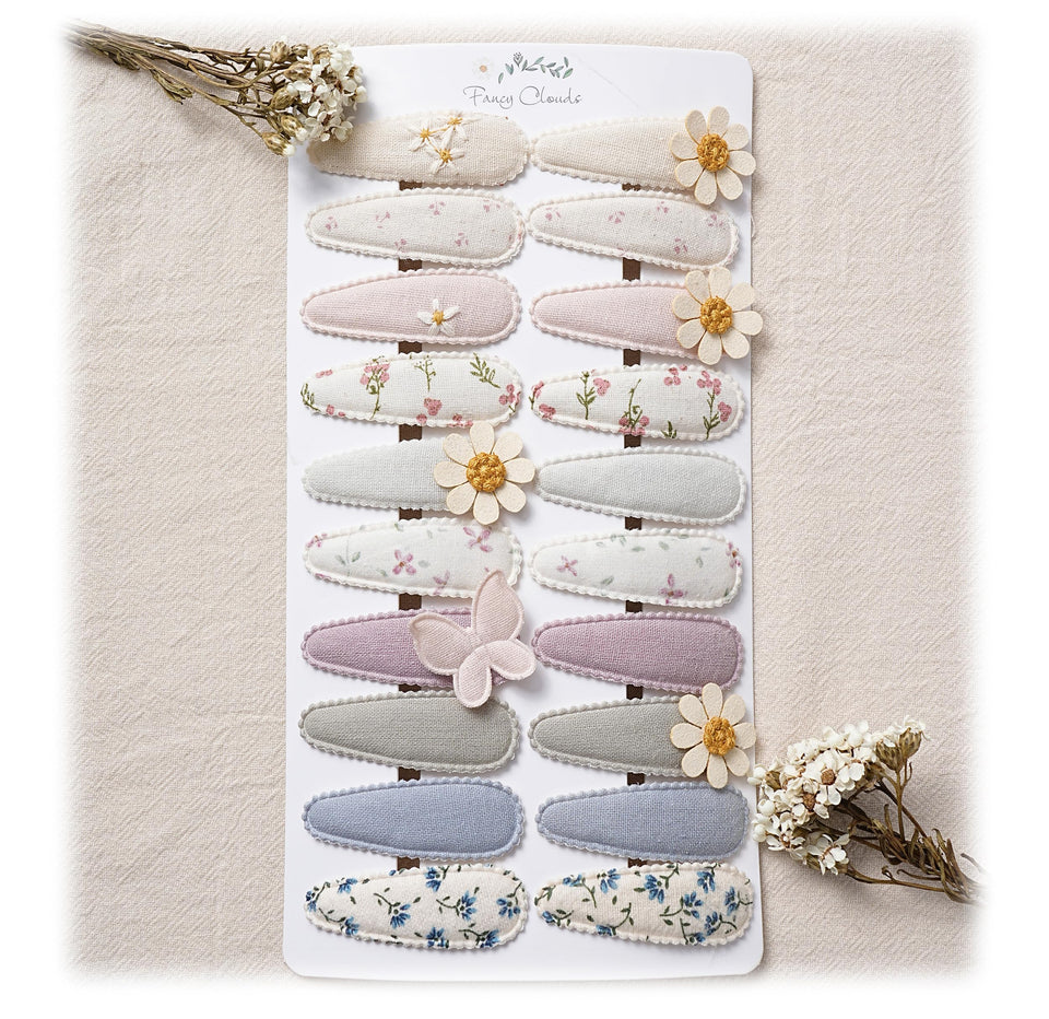 Fancy Clouds daisy embroidery baby clip adds a gentle floral touch