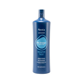 Fanola Wonder Blue Shampoo bottle pouring to show toning action for brassy hair