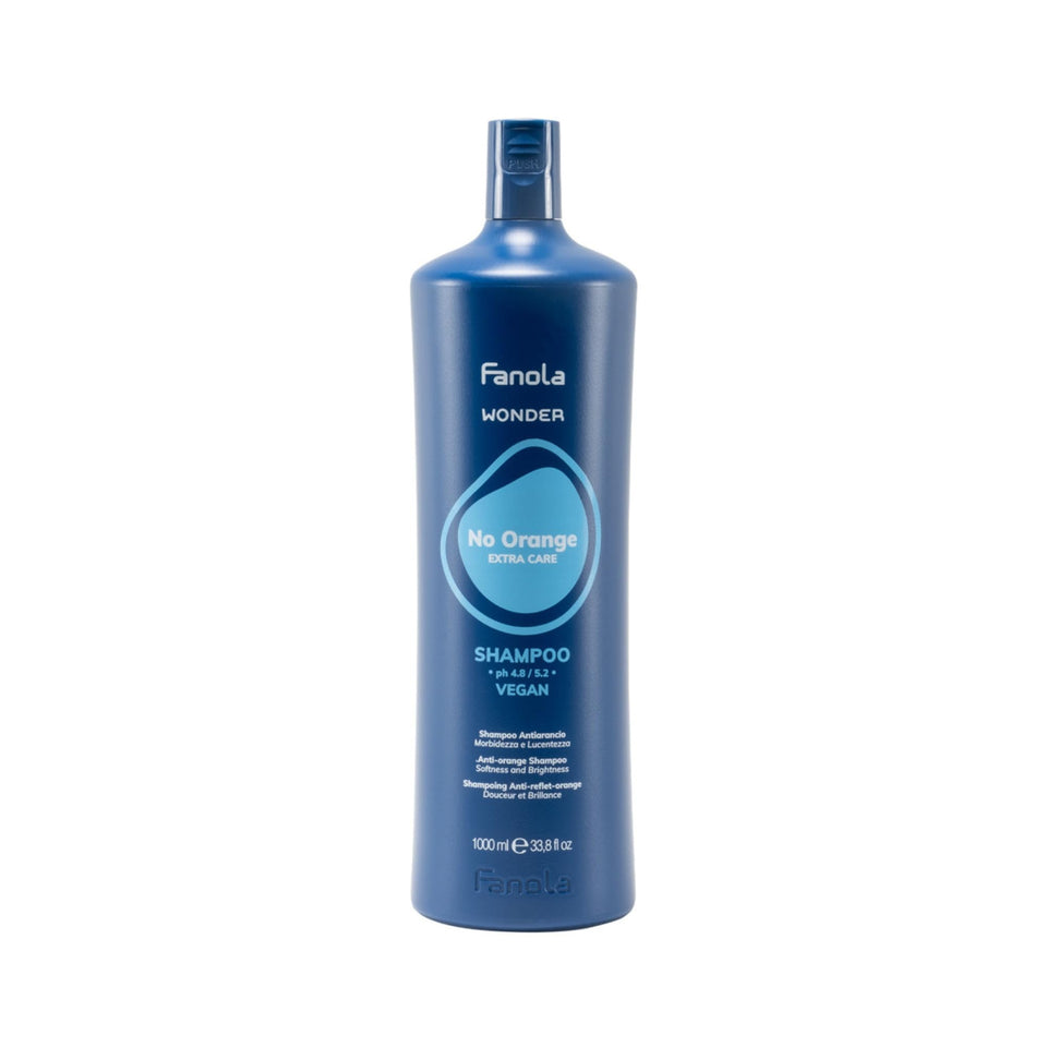 Fanola Wonder Blue Shampoo bottle pouring to show toning action for brassy hair