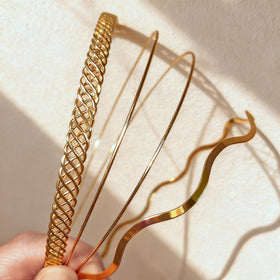 Fanssya three-piece headband set featuring woven mesh for party sparkle.