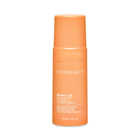 Farmacy Bright On AHA exfoliator bottle front for a quick radiance boost.