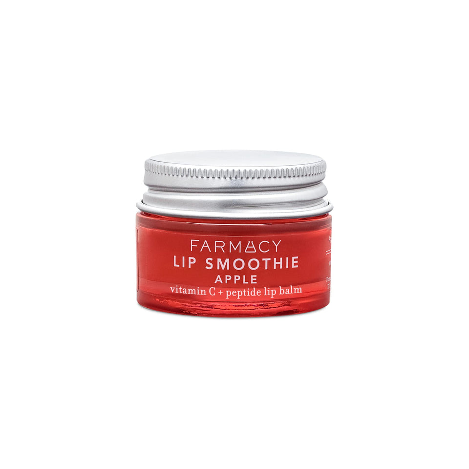 Farmacy Lip Smoothie lip balm tube close-up for hydrating shine.