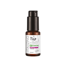 Farmasi Dr. C. Tuna garlic oil bottle showing root-to-tip nourishment for fuller-looking hair.