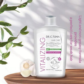 Garlic cloves beside FARMASi shampoo bottle emphasize garlic extract benefits.