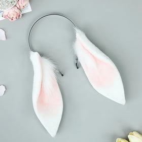 Faylay bunny ears closeup shows soft faux fur texture and realistic shape.