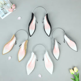 Faylay one-size-fits-most bunny headband for secure wear.