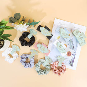 Featch bachelorette party favors in white and sage tones