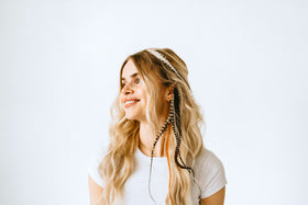 Feather Headz heat styling safe up to 400°F, enabling curls and straightening.
