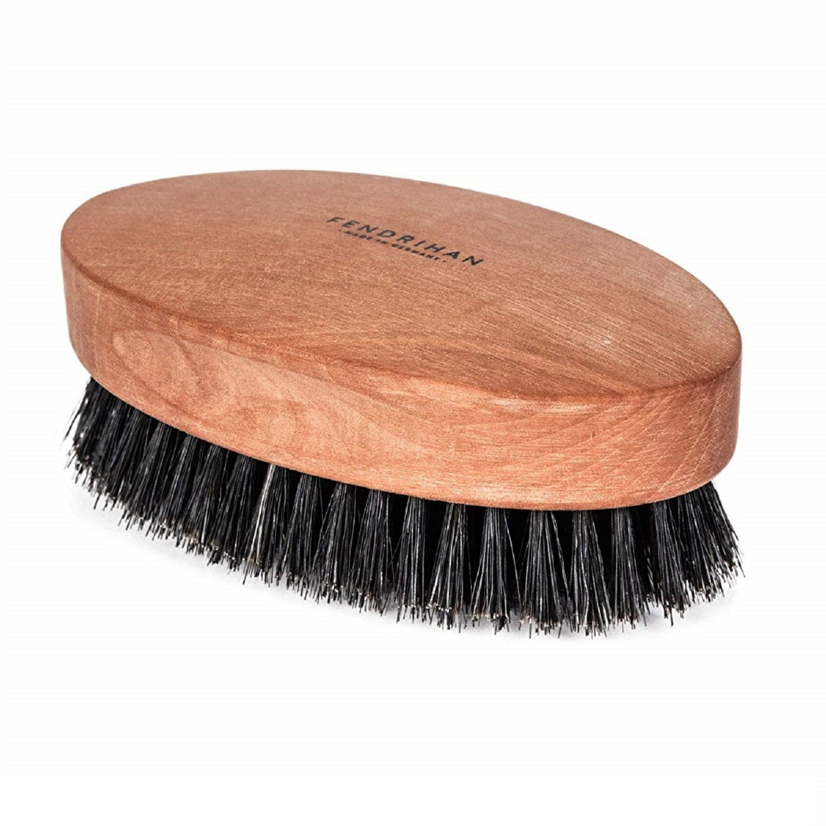Fendrihan dense pear wood handle enhances grip during brushing.