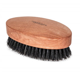 Fendrihan dense pear wood handle enhances grip during brushing.