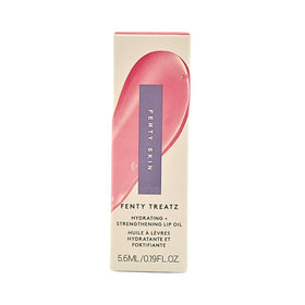 Close-up of the applicator gliding on lips for non-sticky shine