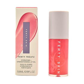 Fenty Beauty Fenty Treatz lip oil bottle with Dragon Fruit delivering deep hydration