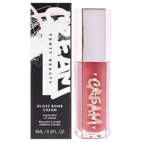 Fenty Beauty Gloss Bomb Color Drip 02 swatch reveals vibrant Fenty Glow shade for bold lips.